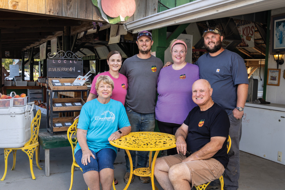 north carolina peaches; Jan and Art Williams, seated, run Kalawi Farm with their children Laura, Ben, Katie and Will.