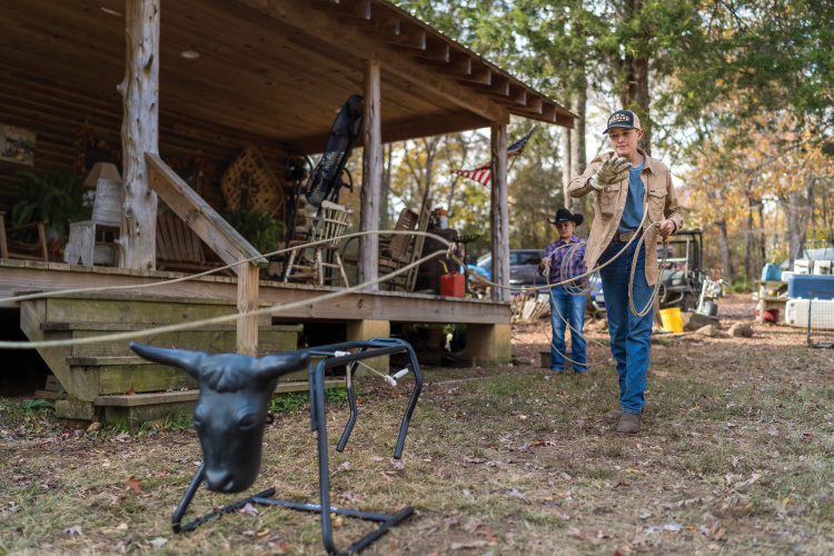 Wesley Bernard practices roping cattle.