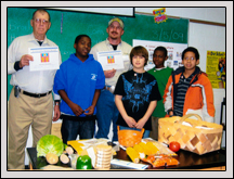Wake County Farm Bureau members Richard Jenks, left, and Jay Thompson visit with students at Leesville Road Middle School on Career Day. Wake County Farm Bureau members Richard Jenks, left, and Jay Thompson visit with students at Leesville Road Middle School on Career Day.