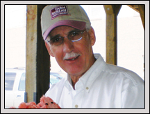 McDowell County Farm Bureau President James Nations helped promote the importance of watermelon during Watermelon Week at the Historic Marion Tailgate Market. 