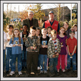 Franklin County Farm Bureau Vice President Alton Foster (back row, left) presented awards to participants in the 4-H Poultry Show.