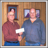 Yadkin County Farm Bureau President Bobby Matthews, left, presents a check for $30,000 to Jason Walker of the Yadkin Soil and Water Conservation District. Yadkin County Farm Bureau President Bobby Matthews, left, presents a check for $30,000 to Jason Walker of the Yadkin Soil and Water Conservation District.