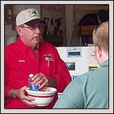 PERSON COUNTY Farm Bureau held its first farm tour Sept. 15 and 16. The tour was designed to give residents an opportunity to visit various farms and learn more about local agriculture. Board member Mickey Clayton, pictured above, talks to visitors to his dairy farm and gave out ice cream samples.