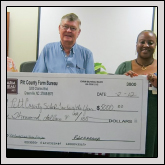 PITT COUNTY Farm Bureau sponsored, for the third year in a row, the awards for Pitt County Schools Teacher of the Year, given in March, and Principal of the Year, given in October. Pictured with the donation of $5,000 are, left to right, County Women’s Committee Chairman Jean Garris, County President Robert Halstead and Pitt County Schools Assistant Superintendent of Human Resources Delilah Jackson.