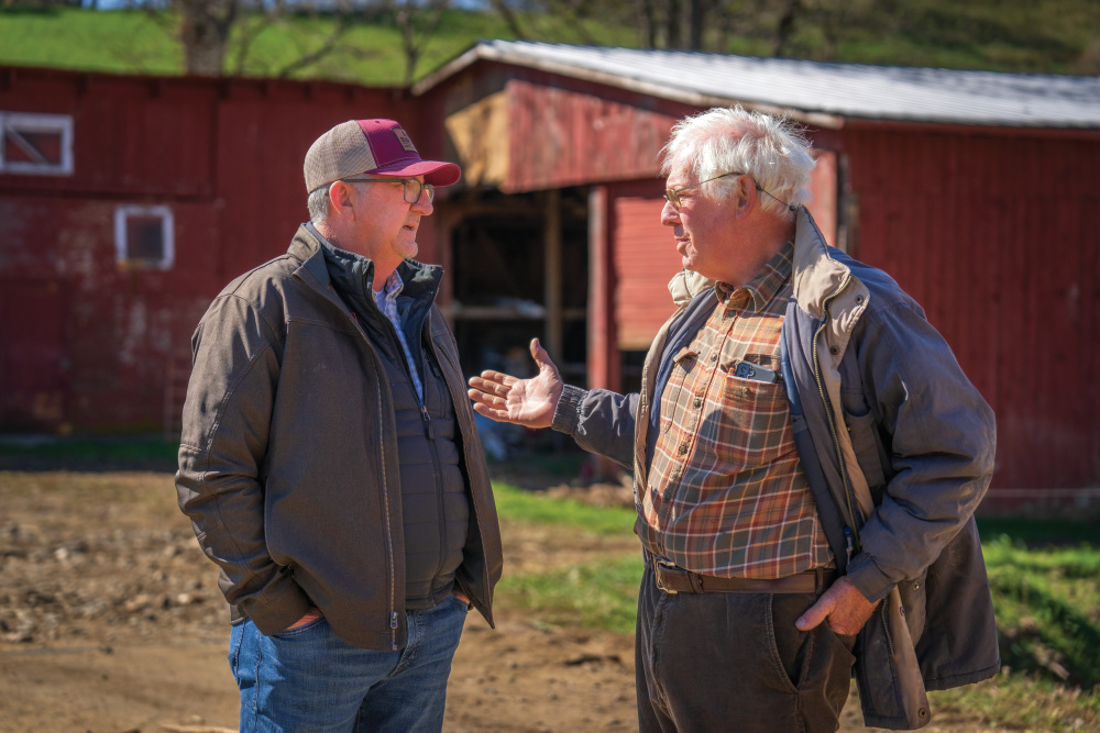 North Carolina Farm Bureau President Shawn Harding, left, talks with Shipley while surveying the damage caused by Hurricane Helene.