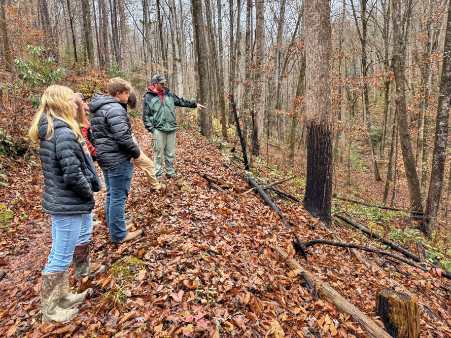 NCFA's Forestry Course; Rosman High School forestry students receive hands-on education in the field – actually,
in the forest – to learn chainsaw safety, how to calculate height and tree volume, and more.