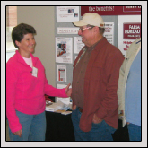 From left to right; Boyce Deitz, staffer for U.S. Rep. Heath Shuler, Macon County Farm Bureau President Joe Deal; and Freddie Harrill, staffer for U.S. Sen. Kay Hagan talk during a Farm-City Breakfast. From left to right; Boyce Deitz, staffer for U.S. Rep. Heath Shuler, Macon County Farm Bureau President Joe Deal; and Freddie Harrill, staffer for U.S. Sen. Kay Hagan talk during a Farm-City Breakfast.