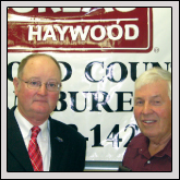 Farm Bureau President Donald Smart, left, presented a plaque to past President Terry Rogers at the county annual meeting in October.