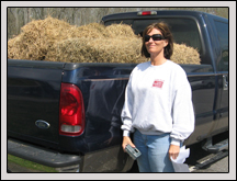 Camden County Farm Bureau member Rene Russell drops off hay for Project Grow. 