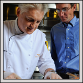 Chef Mark Allison, dean of culinary education at Johnson & Wales, demonstrates how to prepare strawberry slaw as Dr. Jeremy Pattison, strawberry breeder with N.C. State University’s Plants for Human Health Institute, looks on. The pair is a part of the N.C. Strawberry Project. Chef Mark Allison, dean of culinary education at Johnson & Wales, demonstrates how to prepare strawberry slaw as Dr. Jeremy Pattison, strawberry breeder with N.C. State University’s Plants for Human Health Institute, looks on. The pair is a part of the N.C. Strawberry Project.